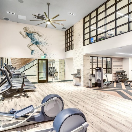 a fitness center with exercise equipment