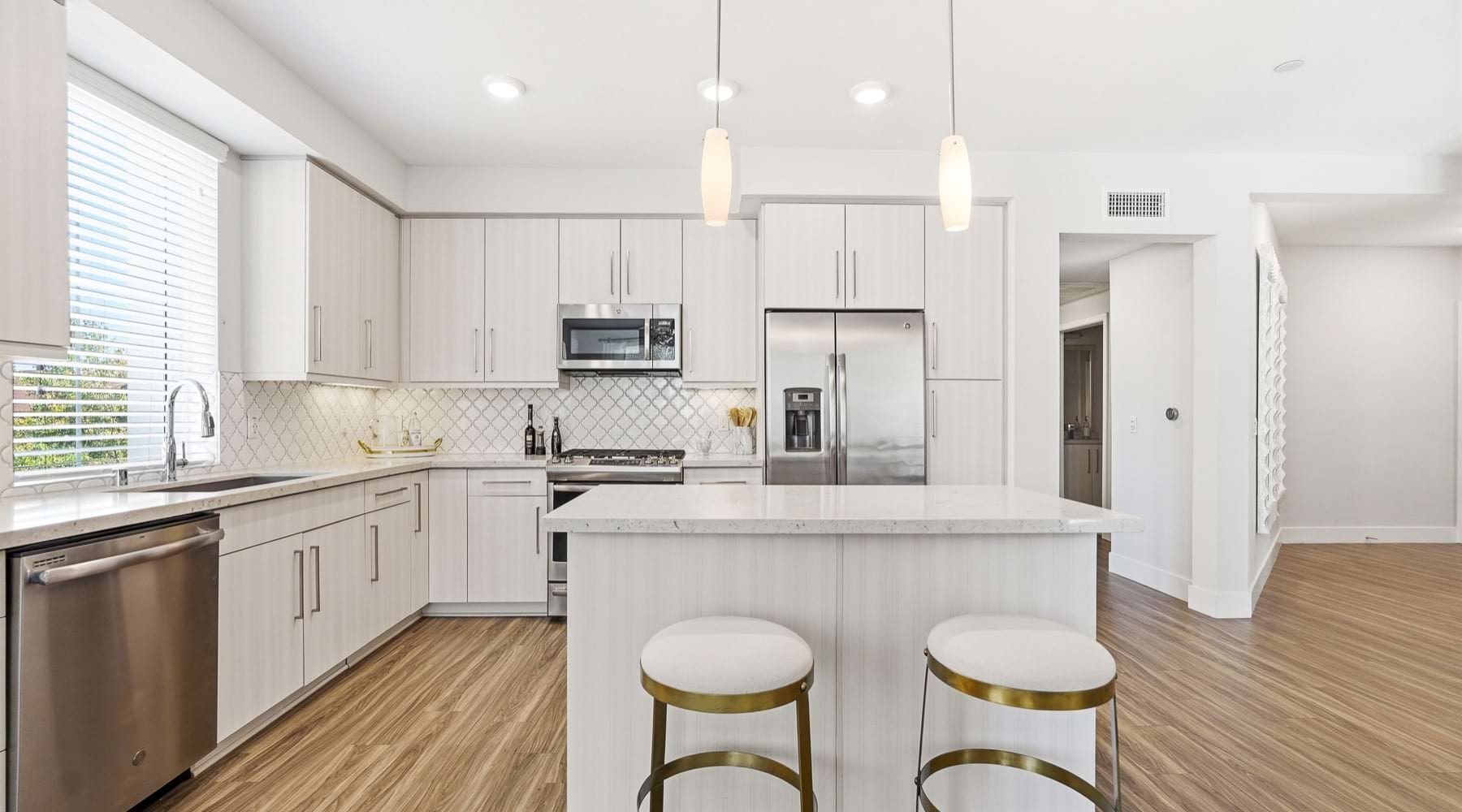 kitchen with white cabinets and stainless steel appliances