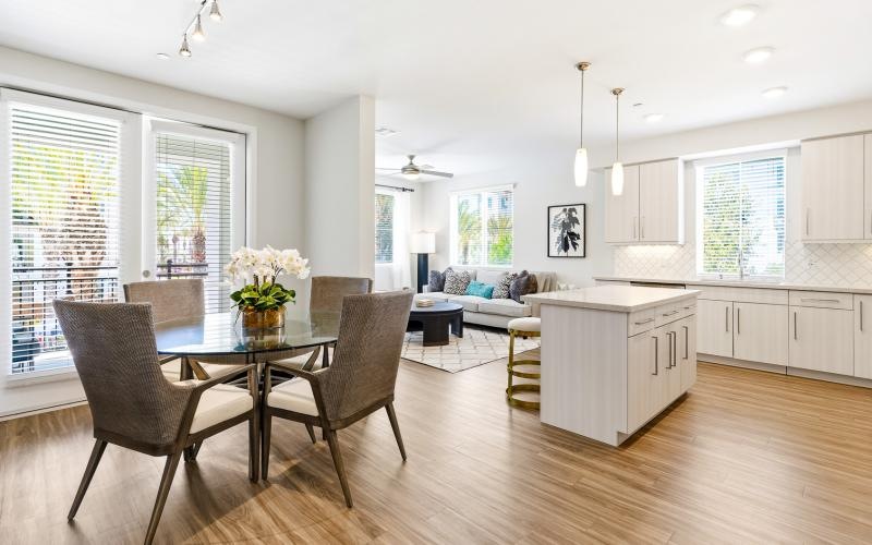 a large kitchen with a dining table
