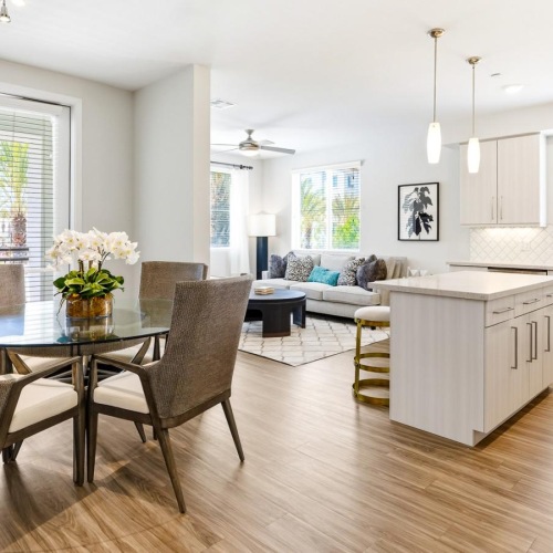 a large kitchen with a dining table